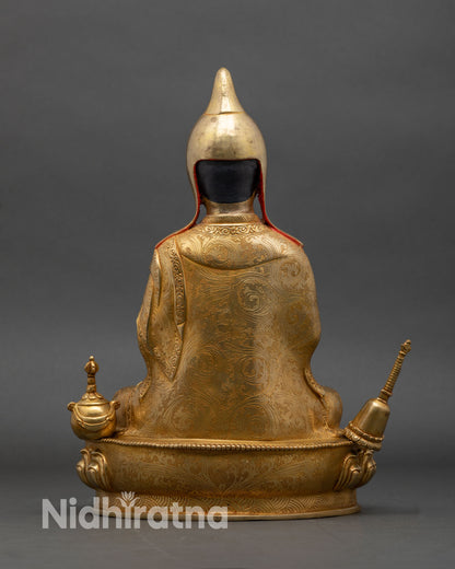 Back view of Atisha Buddhist master statue intricate floral scrollwork Nepal