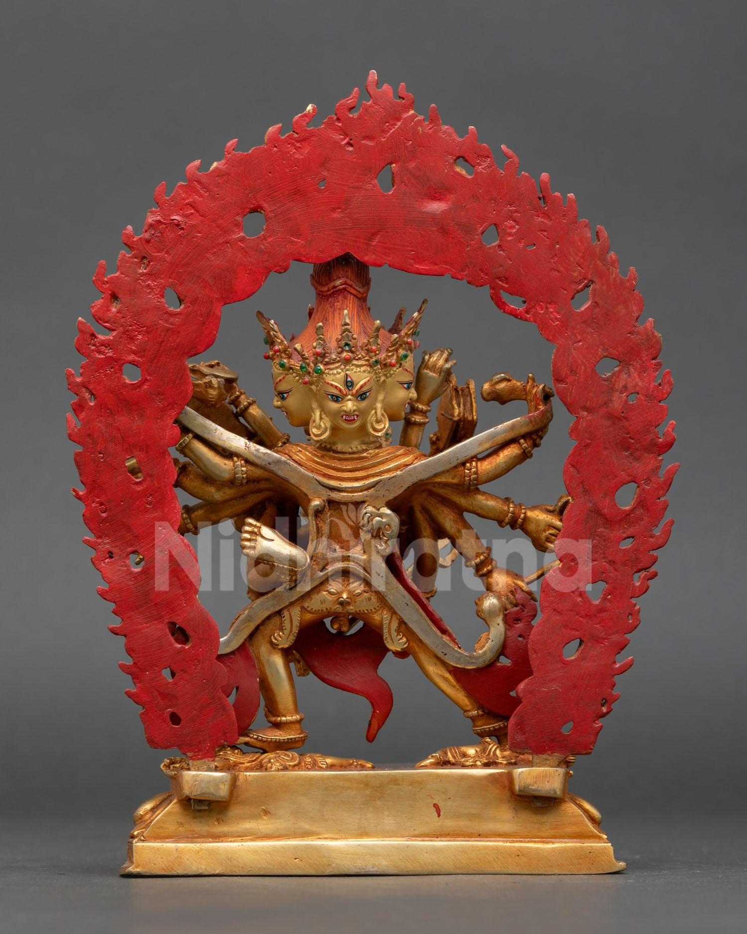 back view of chakrasamvara statue showing ornate halo carvings and lotus throne details