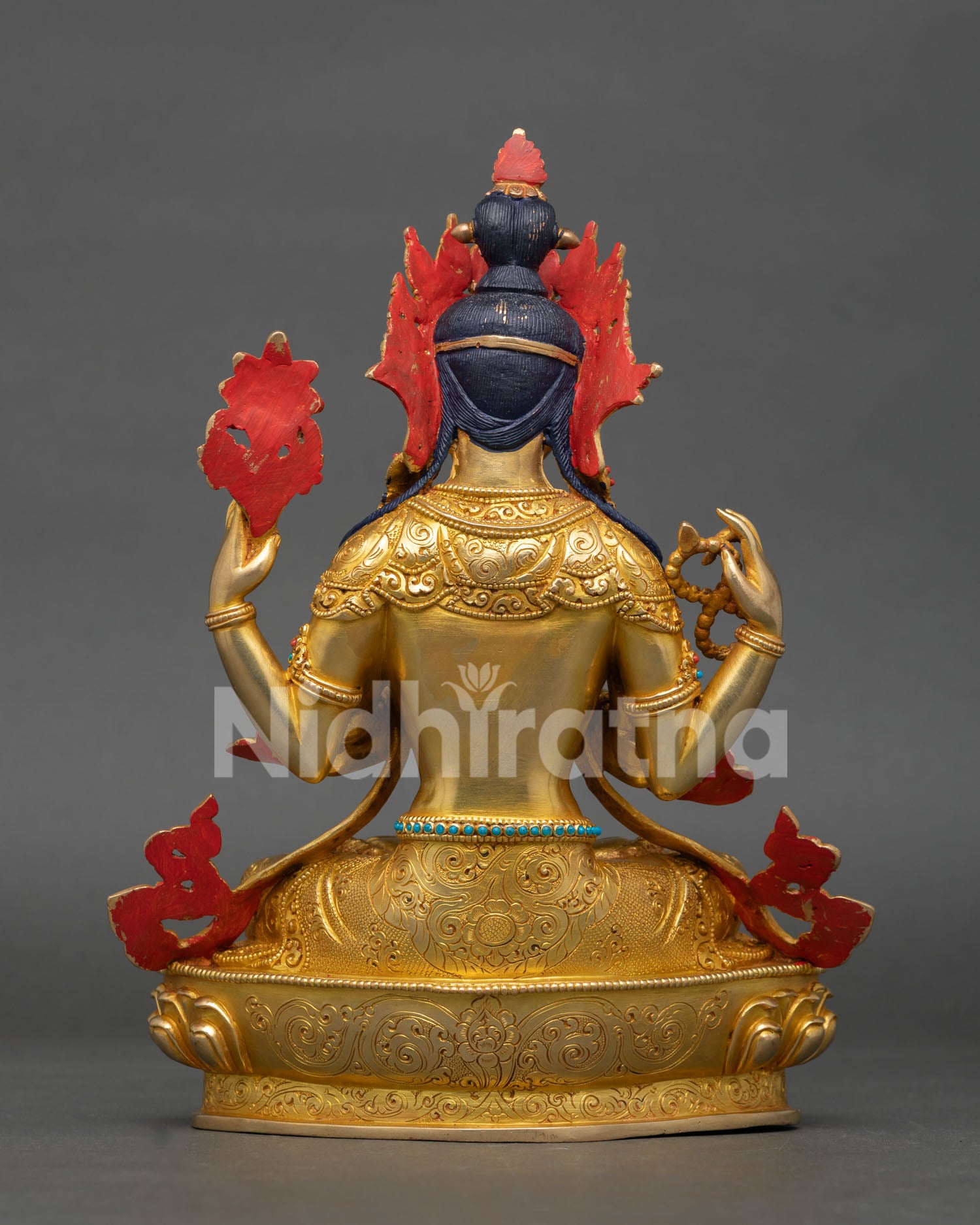 back view of chenrezig avalokiteshvara statue with detailed lotus throne and gold accents