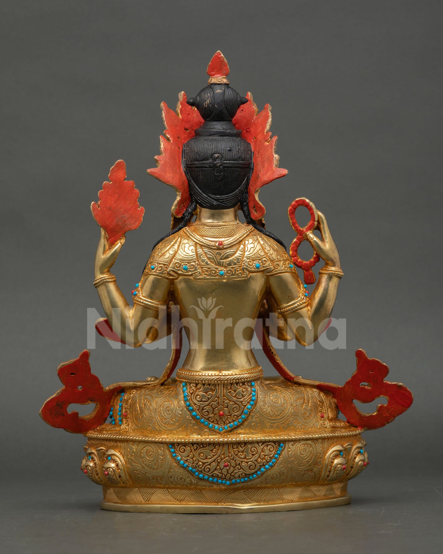 Back view of Chenrezig Buddhist statue highlighting copper body gold finish and Nepalese artisan metalwork details