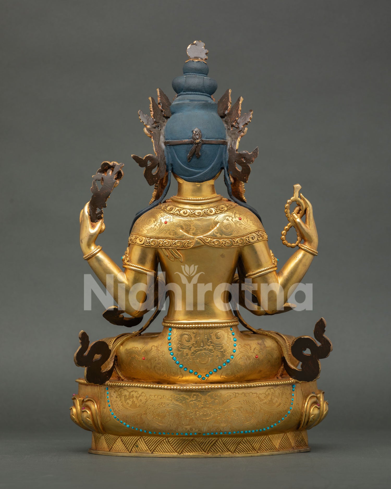 Back view of Chenrezig Statue highlighting intricate copper carving and sacred Buddhist craftsmanship