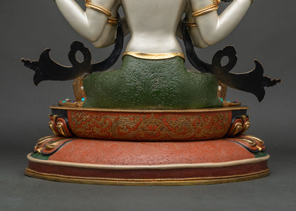 Back view of Chenrezig statue's lotus pedestal with engraved floral motifs