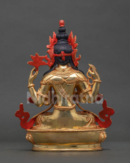 Back view of Chenrezig statue with red painted backing, gold back detail and lotus base, Nepal