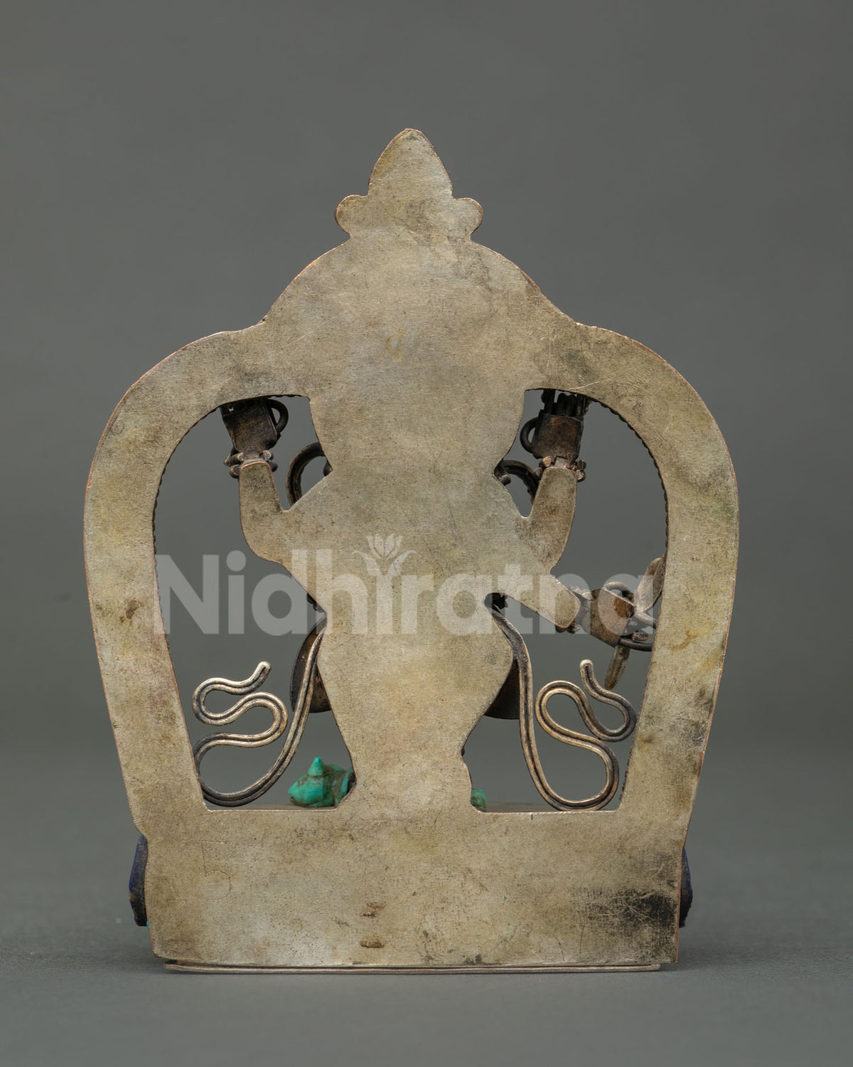 back view of copper ganesh statue from nepal showing newari craftsmanship