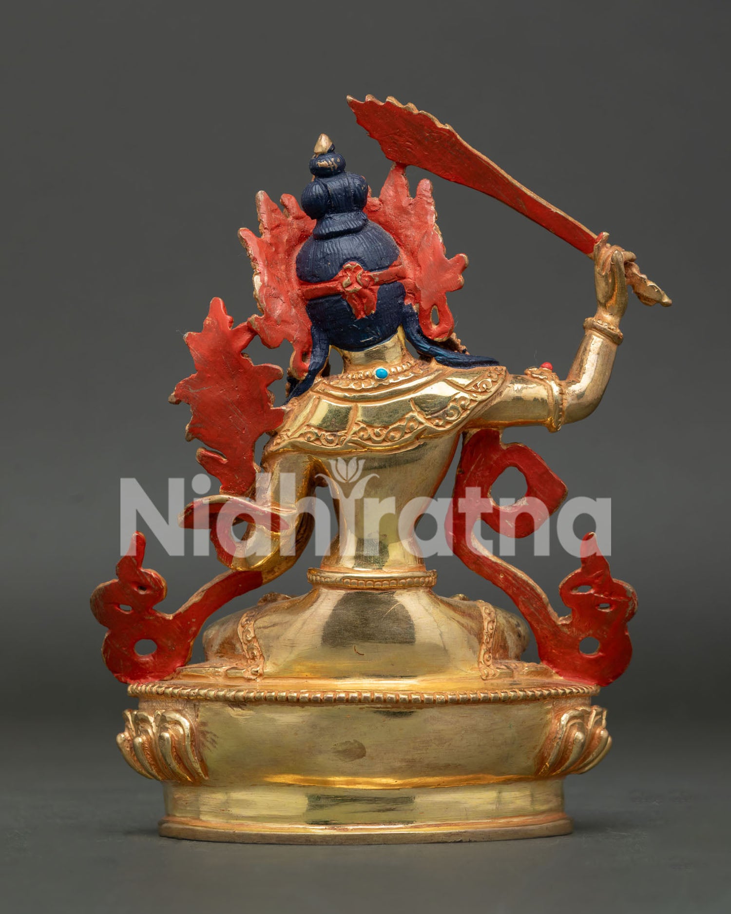 Back View of Copper Manjushri Statue, Showcasing Traditional Buddhist Artistry