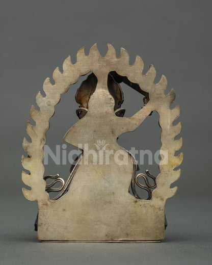 back view of copper sankata devi statue from nepal showing flame halo and newari craftsmanship