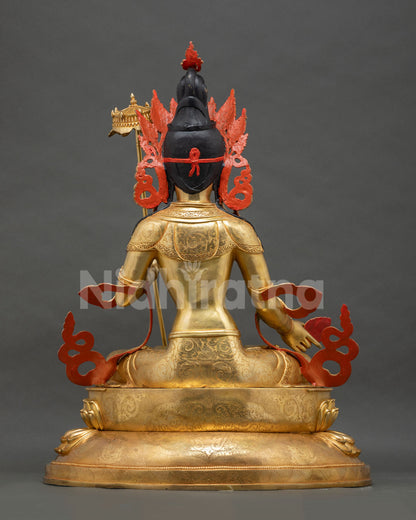 Back view of Dukar Sitatapatra statue showing gold gilded crown and lotus base, Nepal