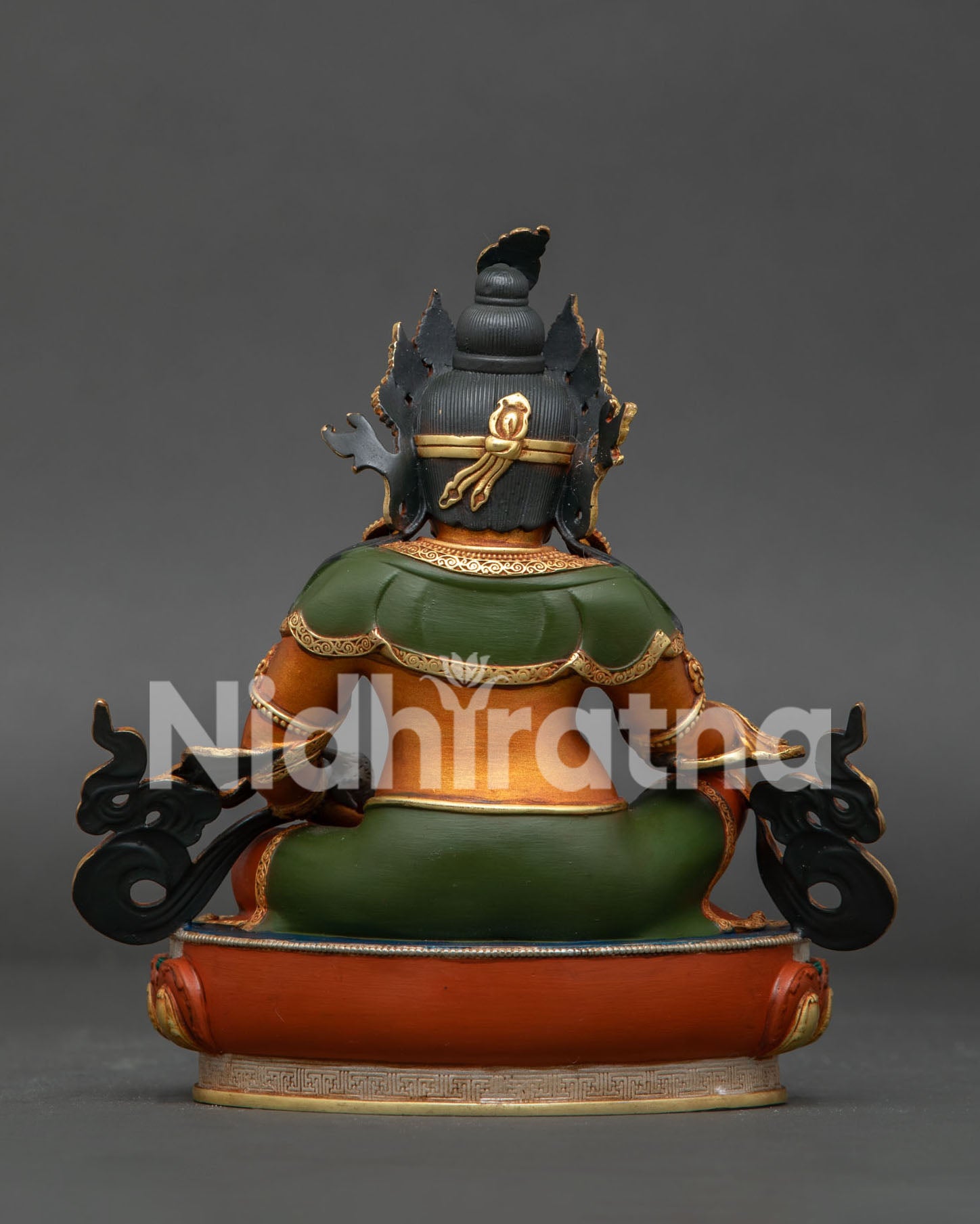 Back View of Dzambhala Statue Showing Detailed Robes and Traditional Craftsmanship