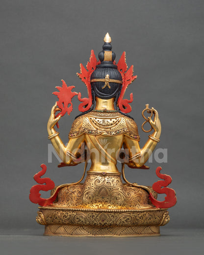 Back view of four-armed Avalokiteshvara statue showing repoussé metalwork.