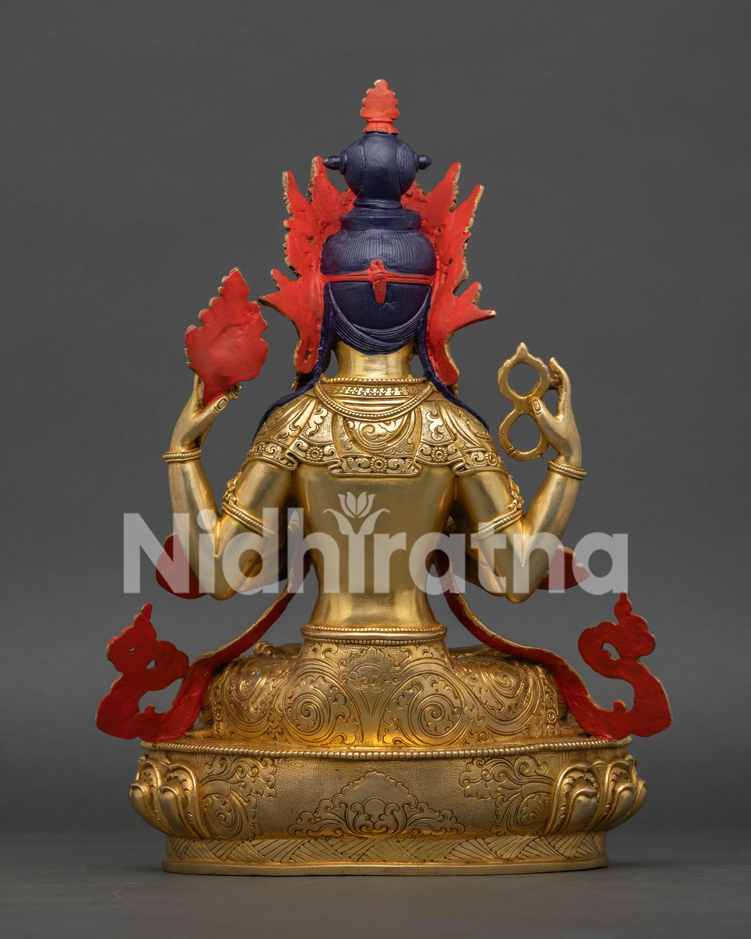 Back View of Four-Armed Chenrezig Statue Showing Detailed Robes and Traditional Lost-Wax Artistry