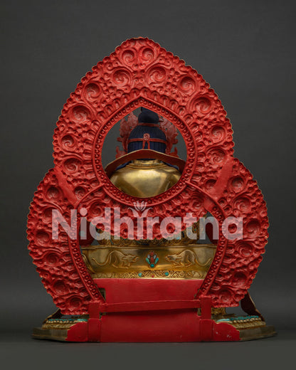 Back View of Genuine Handmade Dzambhala Statue with Floral Halo and Throne Engravings