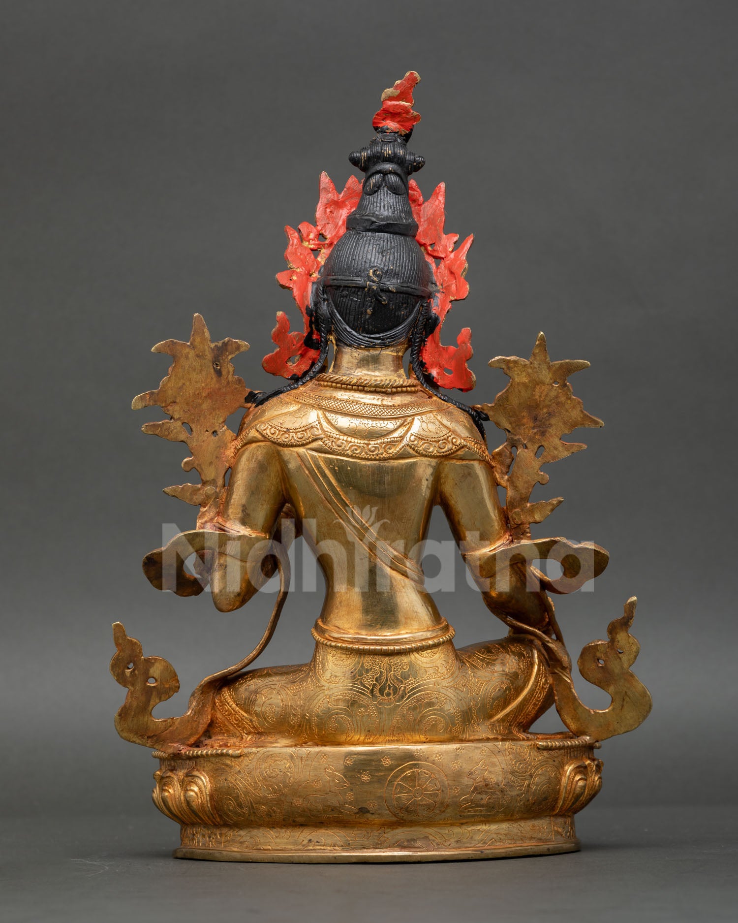 Back view of Green Tara Buddhist statue for meditation altar and spiritual decor