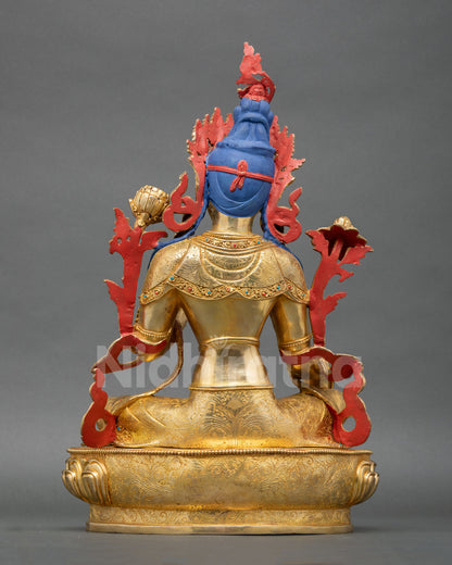 Back view of Green Tara Buddhist statue with detailed robes and sacred lotus pedestal