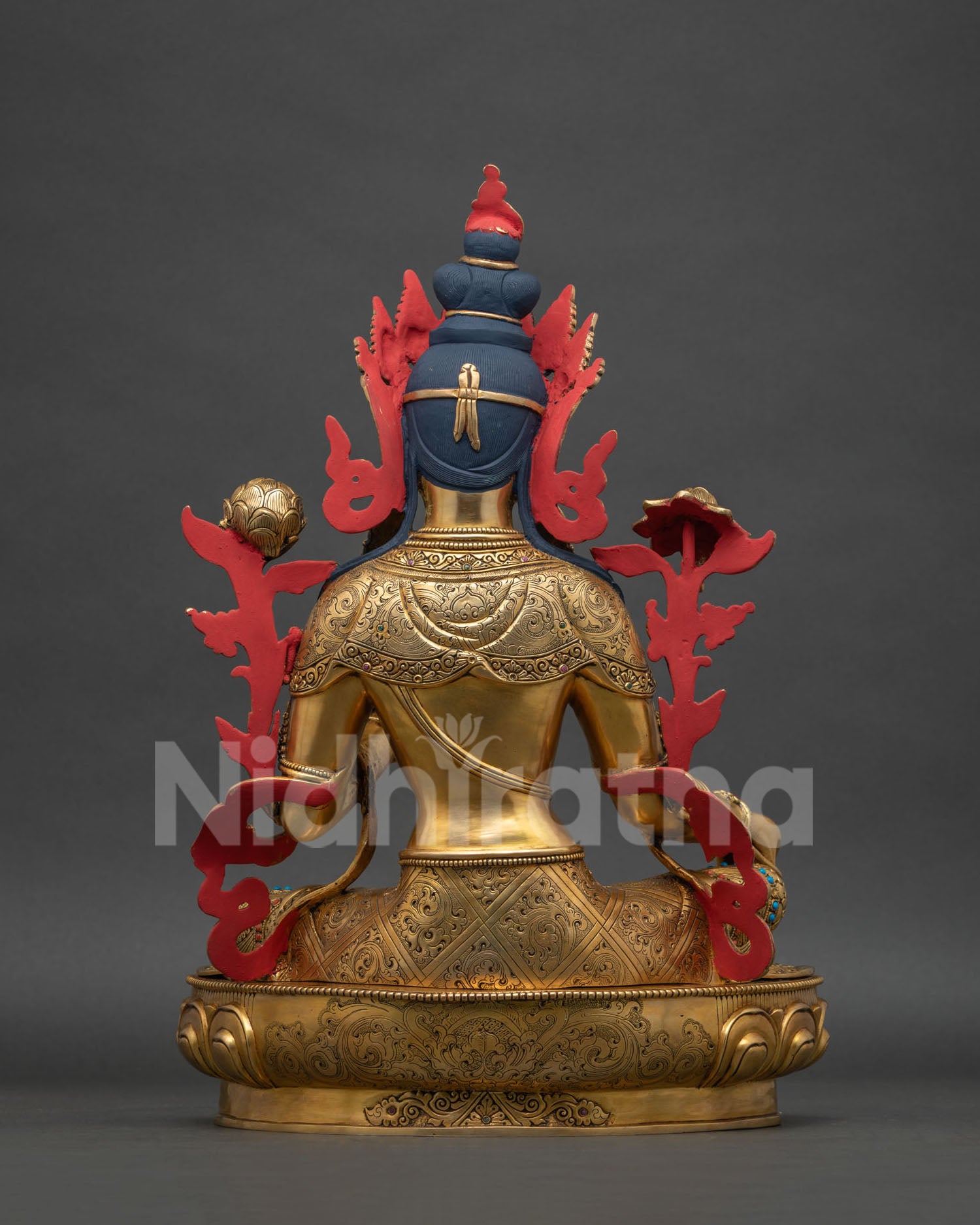Back view of Green Tara statue, gold-gilded copper sculpture from Nepal