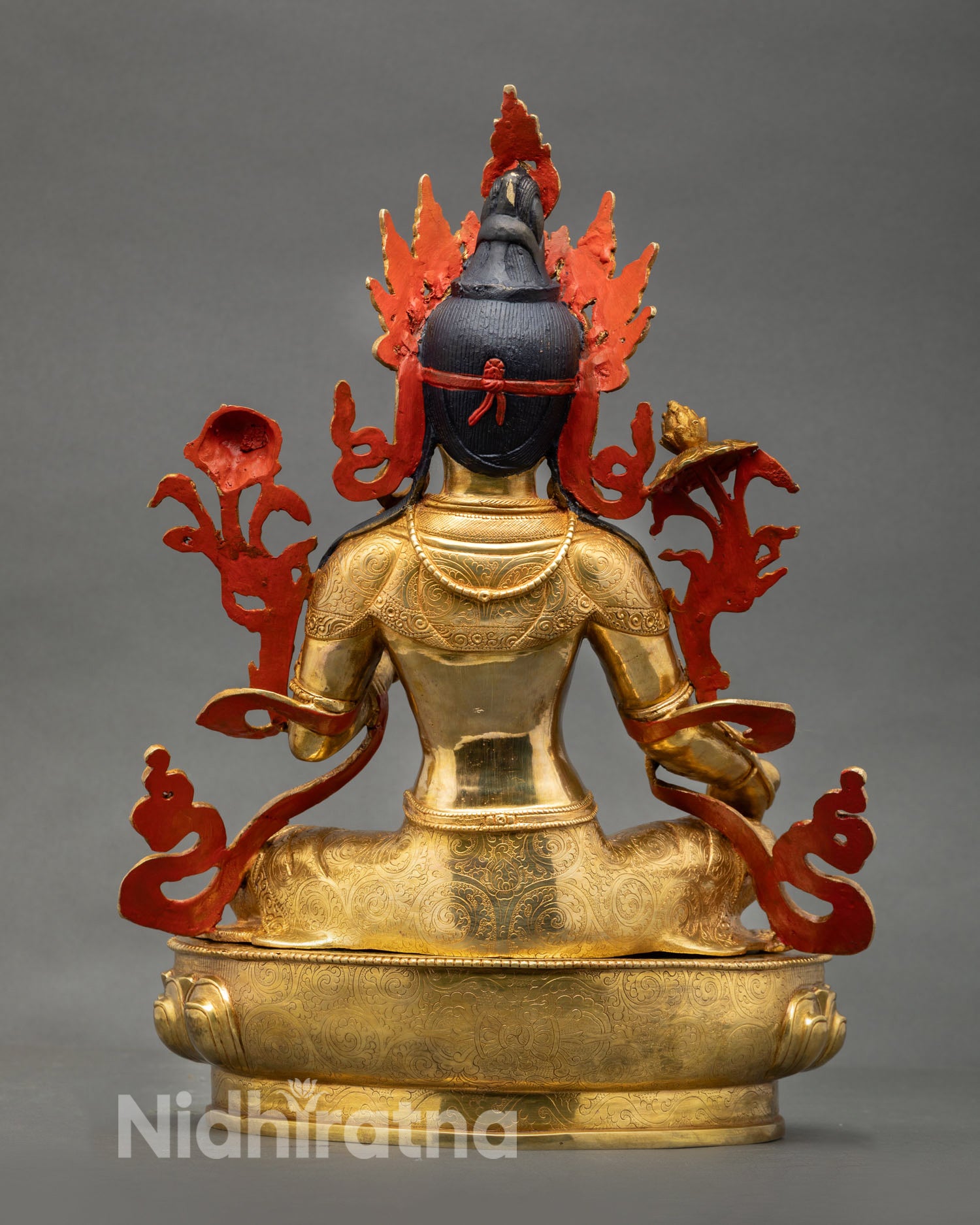 Back view of Green Tara statue with gold gilded finish, intricate metalwork, Newari craftsmanship for spiritual altar decor