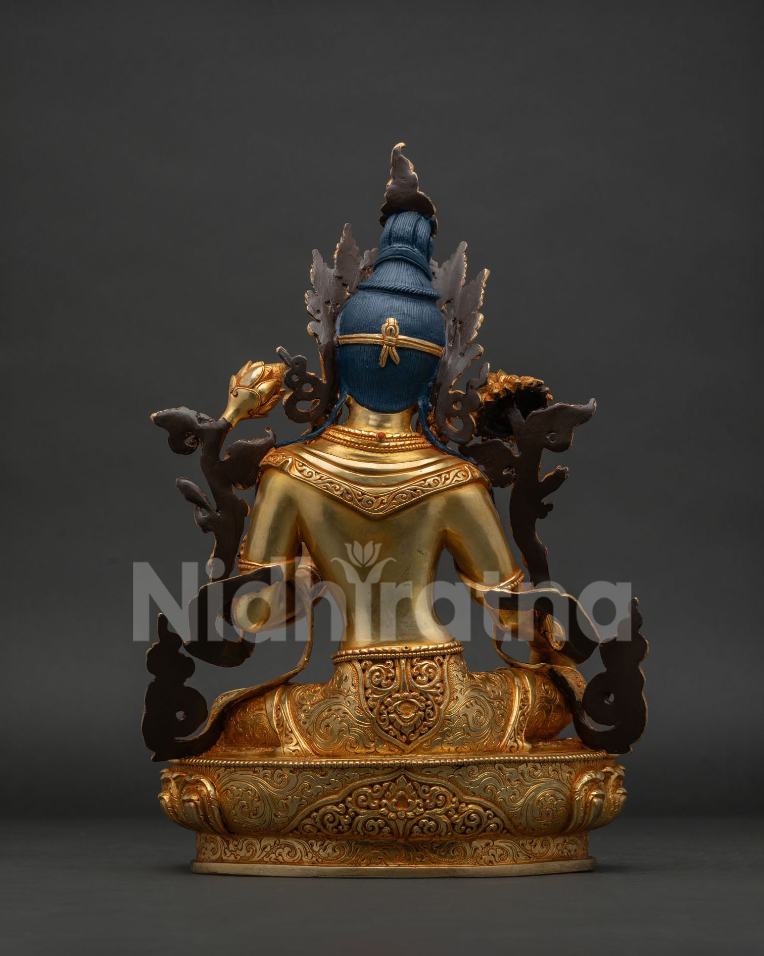 Back view of Green Tara Statue, hand-carved lotus base with fire-gilded finish