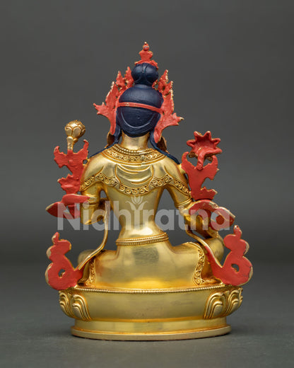 Back view of Green Tara statue, handcrafted Nepalese metalwork and detailed Buddhist sculpture design