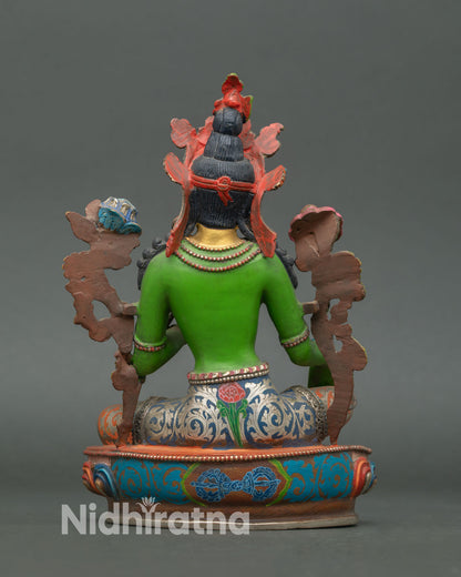 Back view of Green Tara statue highlighting detailed copper carving, floral lotus base design, and traditional Nepalese sacred spiritual artwork