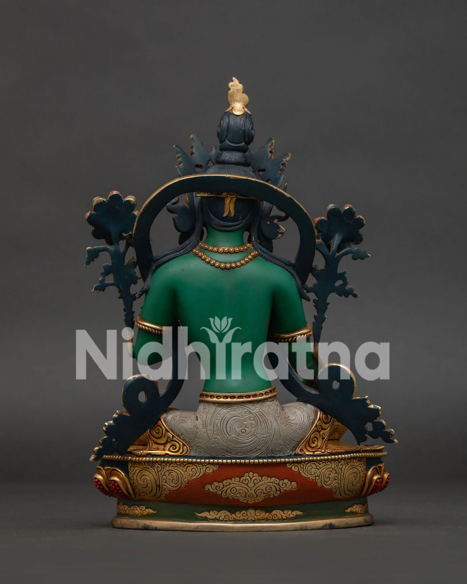 Back view of Green Tara Statue — mantra-engraved lotus base and gold-gilded copper