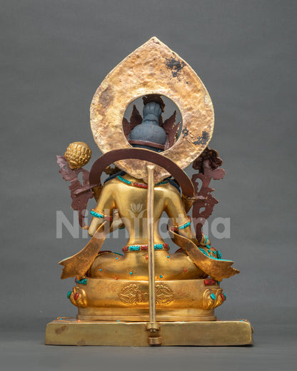 Back view of Green Tara statue with aureole, 24K gold fire gilded copper handcrafted in Nepal