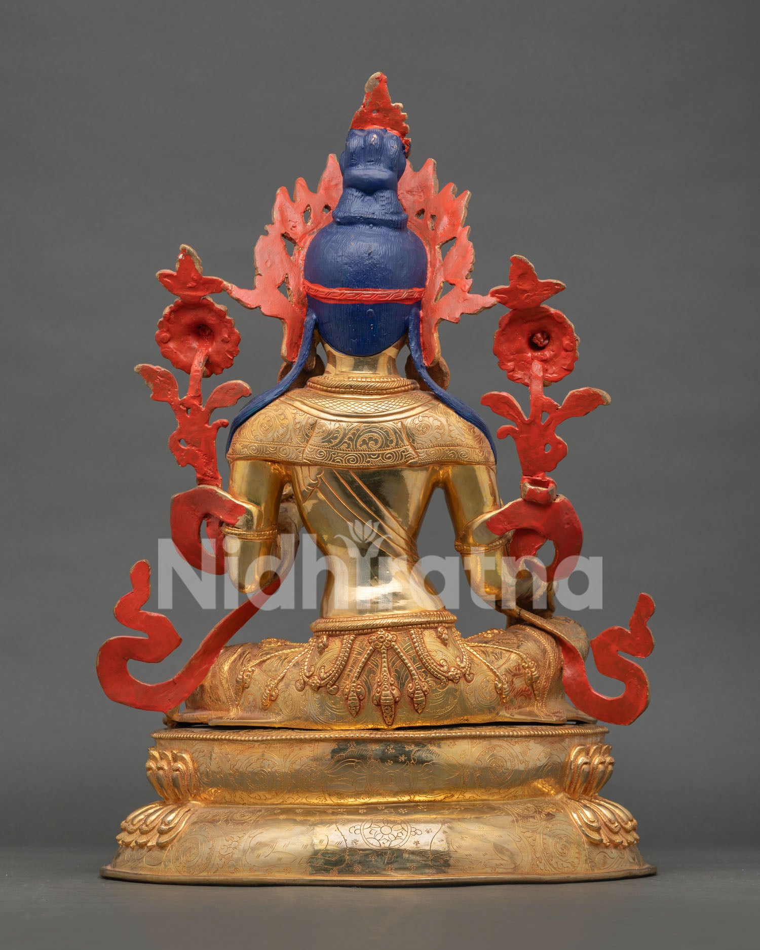 Back view of Green Tara statue with engraved robes, double lotus pedestal, and handcrafted Newari artistry