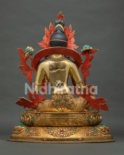 Back view of Green Tara statue with sacred mantra engraved lotus pedestal