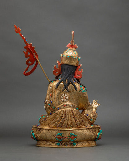Back view of Guru Rinpoche statue, carved robes and lotus pedestal, Nepalese sacred art