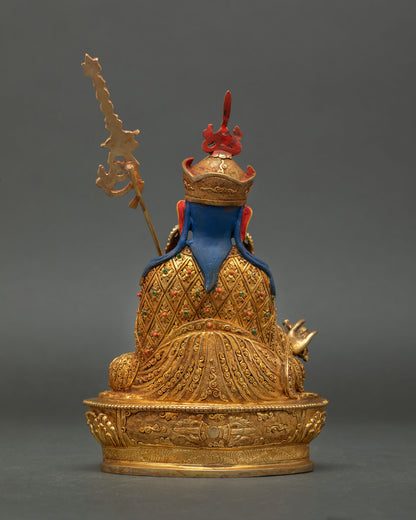 Back view of Guru Rinpoche statue from Kathmandu Valley Newari artisan work with decorative motifs and sacred stone embellishments