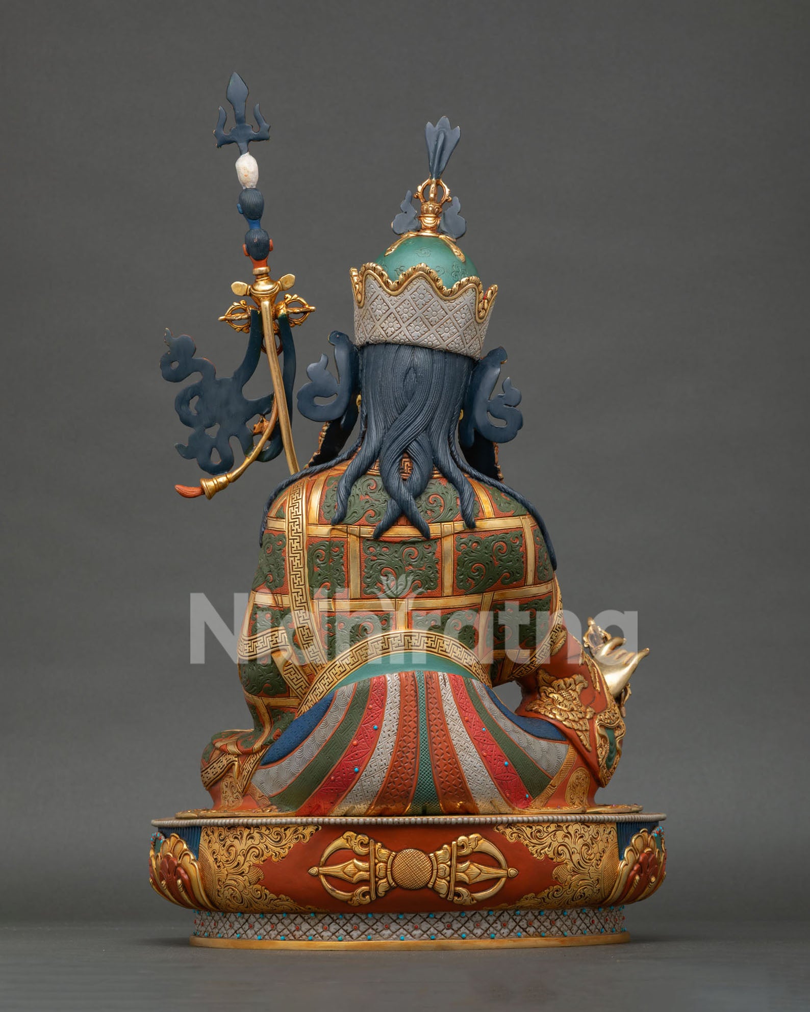 Back view of Guru Rinpoche Statue revealing detailed craftsmanship and ornate ceremonial attire