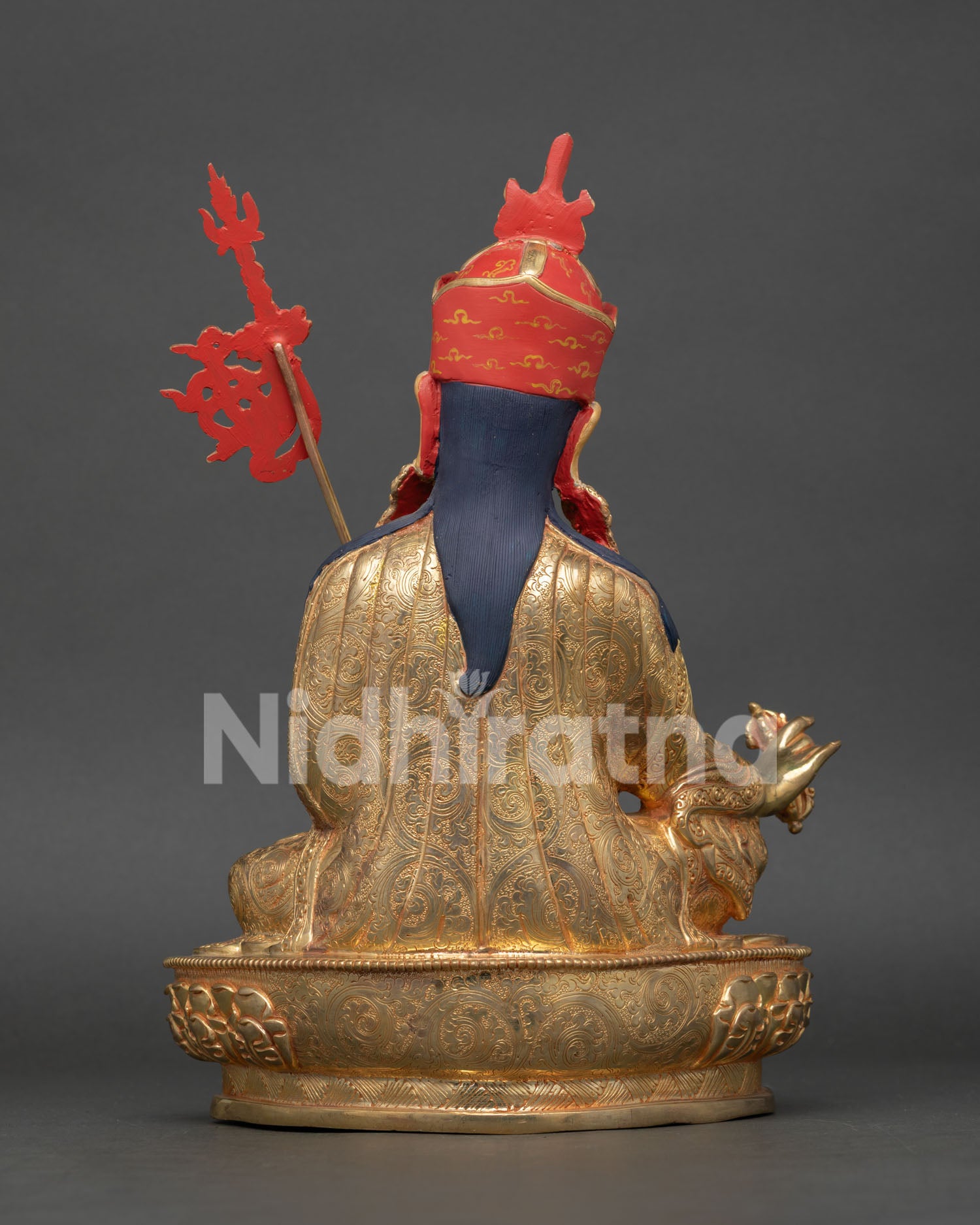 Back view of Guru Rinpoche statue revealing intricate lost wax casting details and traditional Himalayan craftsmanship