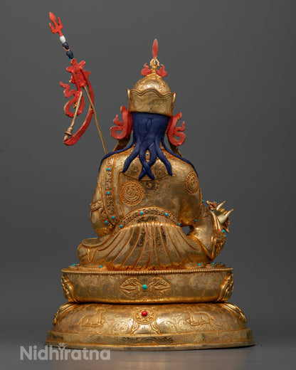 Back view of Guru Rinpoche statue showcasing intricate carvings, gold-gilded details, and traditional Nepalese craftsmanship.