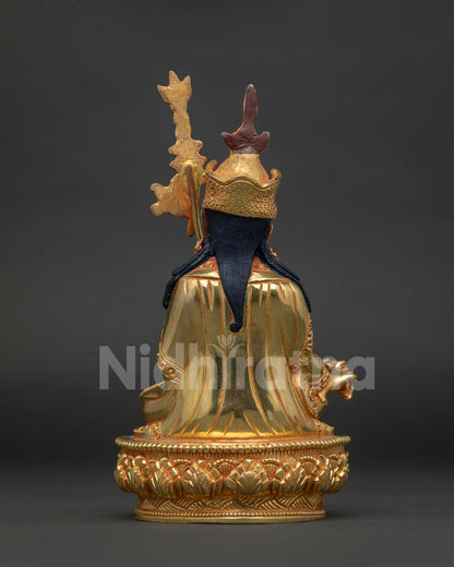 Back-View of Guru Rinpoche statue showcasing Newari craftsmanship and lotus pedestal.