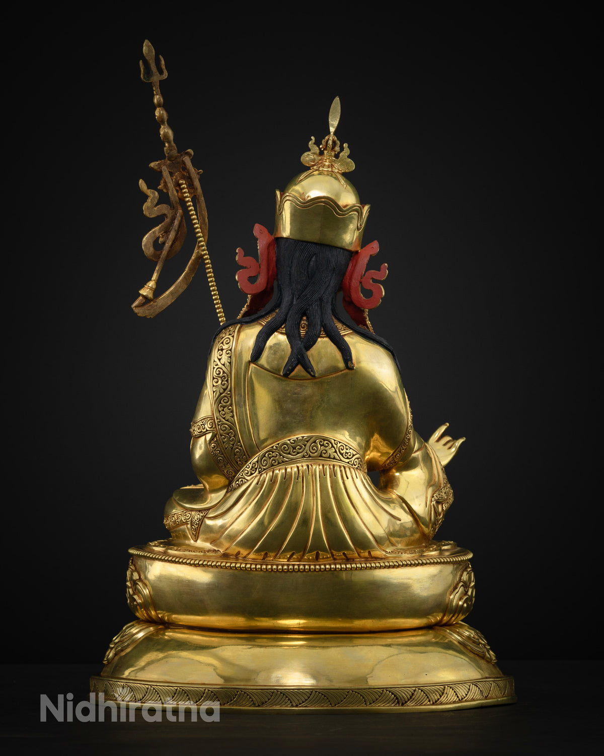 Back view of Guru Rinpoche statue showing hand cast copper alloy and Newari craftsmanship from Nepal