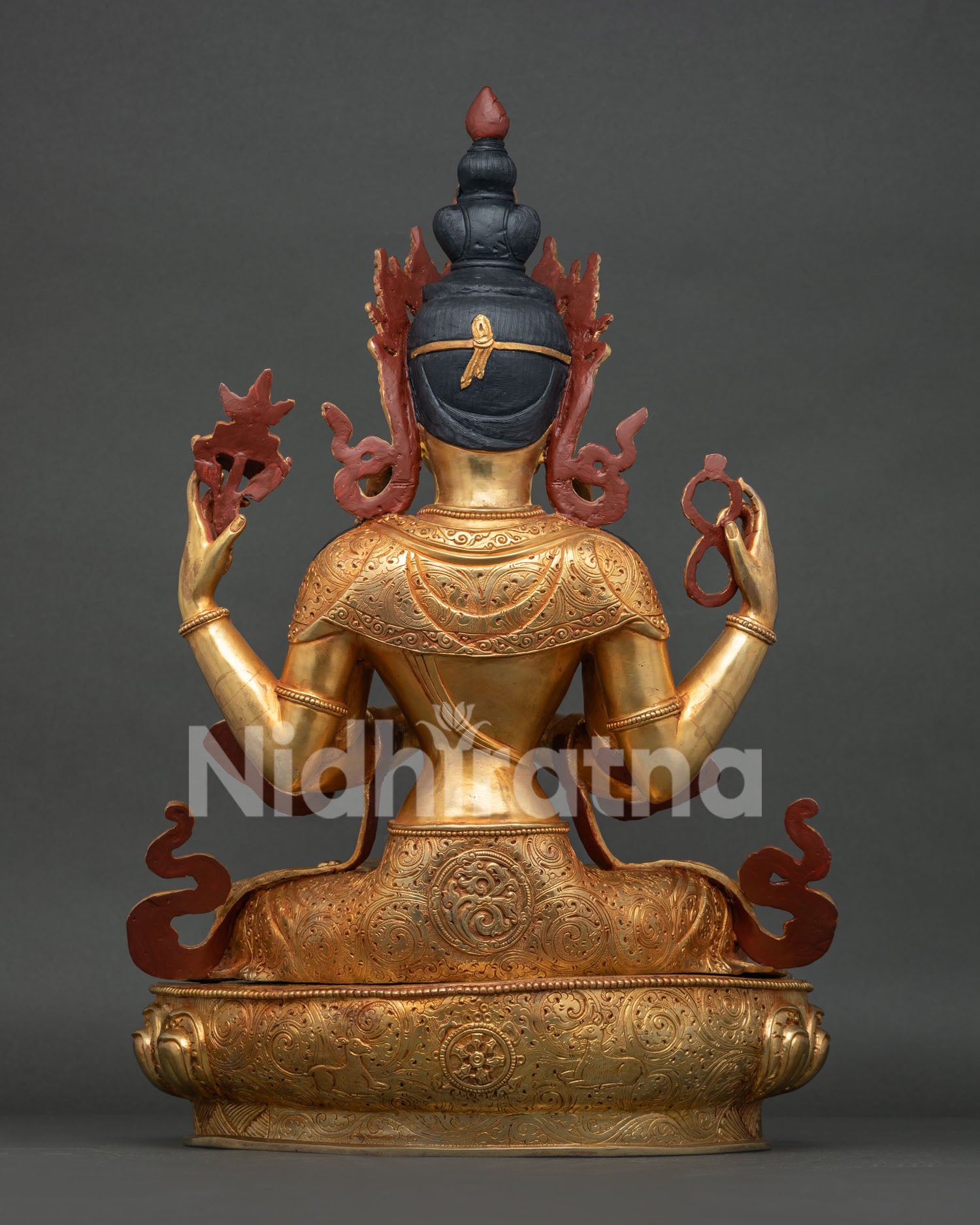 Back side of Newar-crafted Avalokiteshvara statue on carved copper lotus seat