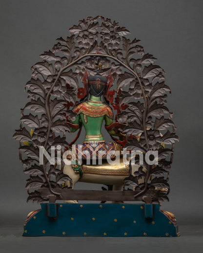 Back view of hand-carved floral aureole on Green Tara Buddhist statue