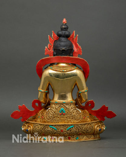 Back view of handcrafted Amitayus statue adorned with gold gilding and semi-precious stones
