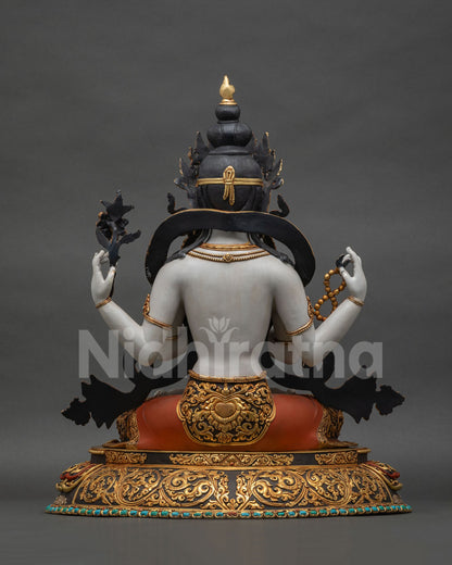 Back view of handcrafted Chenrezig Avalokiteshvara statue with detailed repoussé patterns