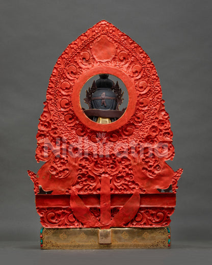 Back view of handcrafted copper Chenrezig statue showing lost-wax casting and lotus base