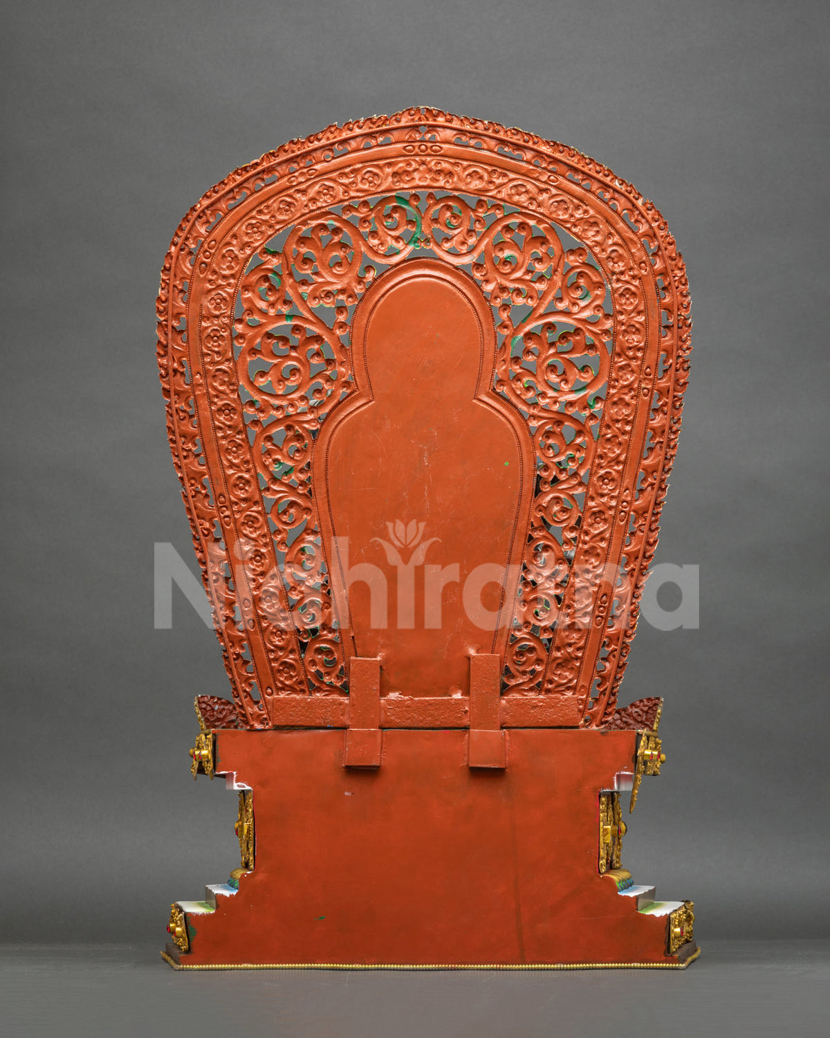 Back view of handcrafted copper Ganesha statue and lion throne with detailed Newari metalwork