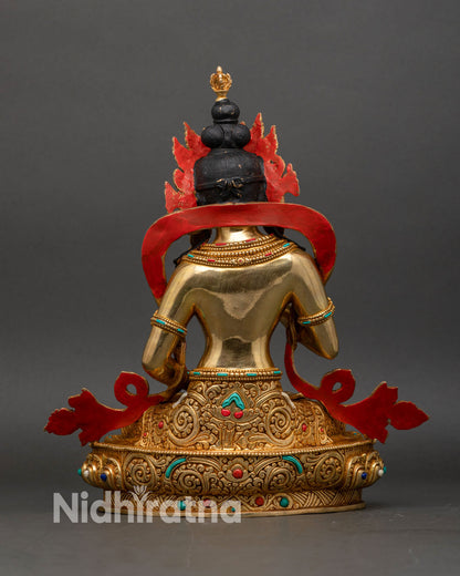 Back view of handcrafted copper Vajrasattva adorned with gold gilding and colorful stones