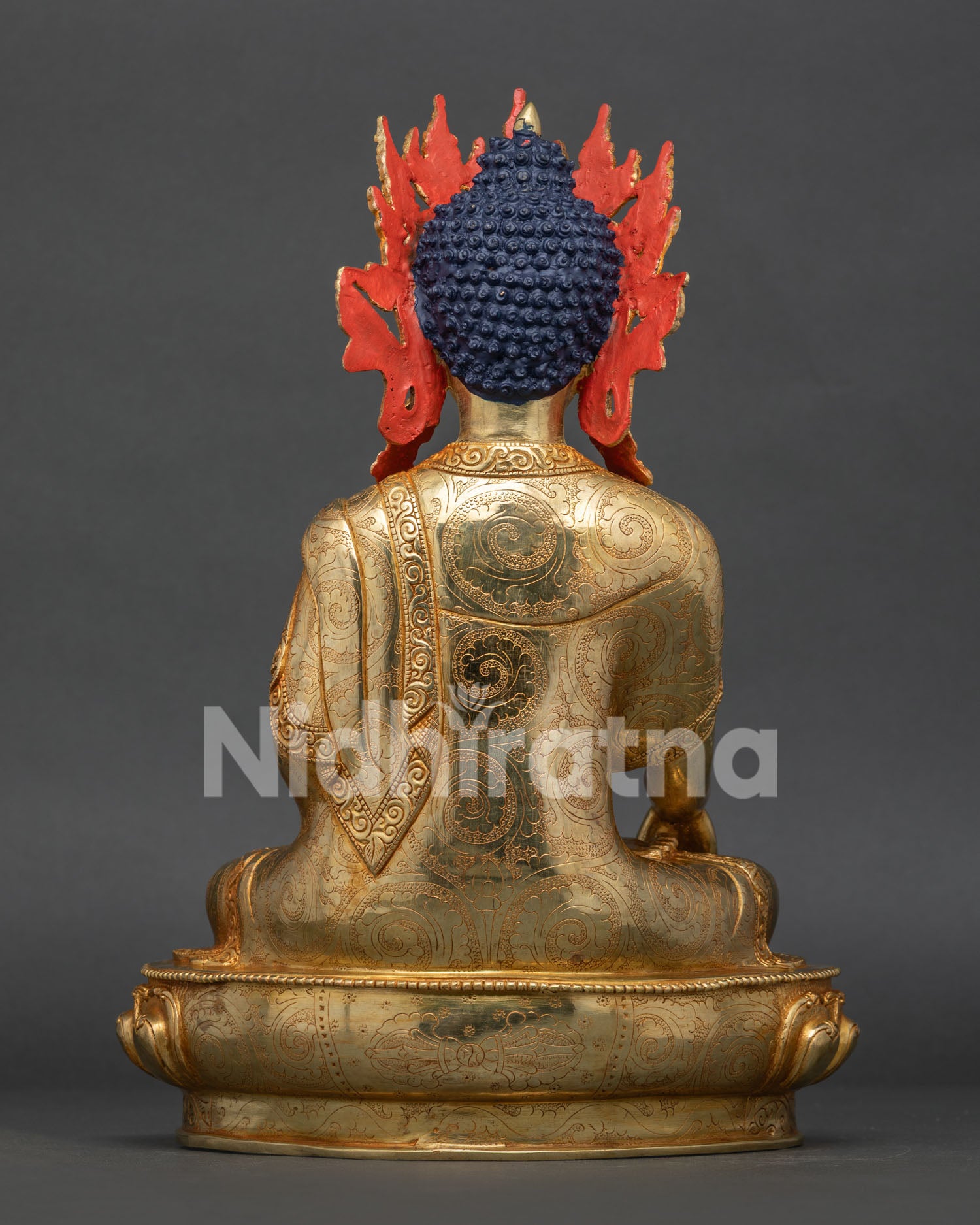Back view of handcrafted Crowned Shakyamuni Buddha statue with ornate gold details