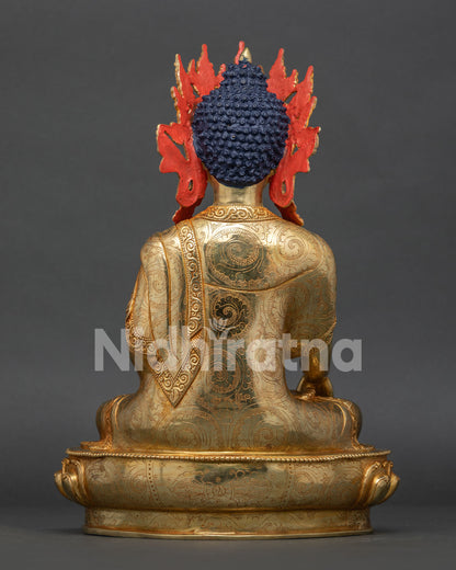 Back view of handcrafted Crowned Shakyamuni Buddha statue with ornate gold details