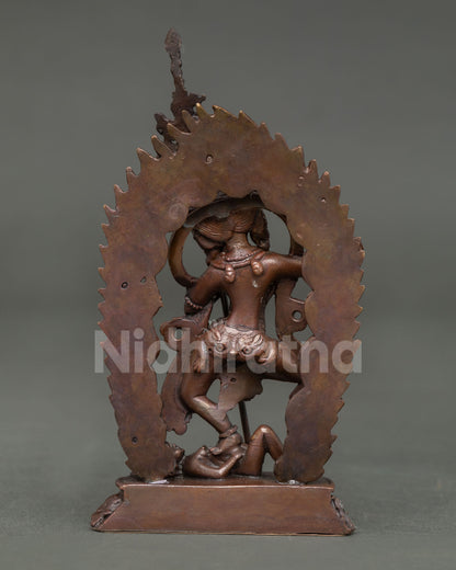 Back view of handcrafted Dorje Phagmo statue from Nepal showcasing intricate oxidized copper artistry