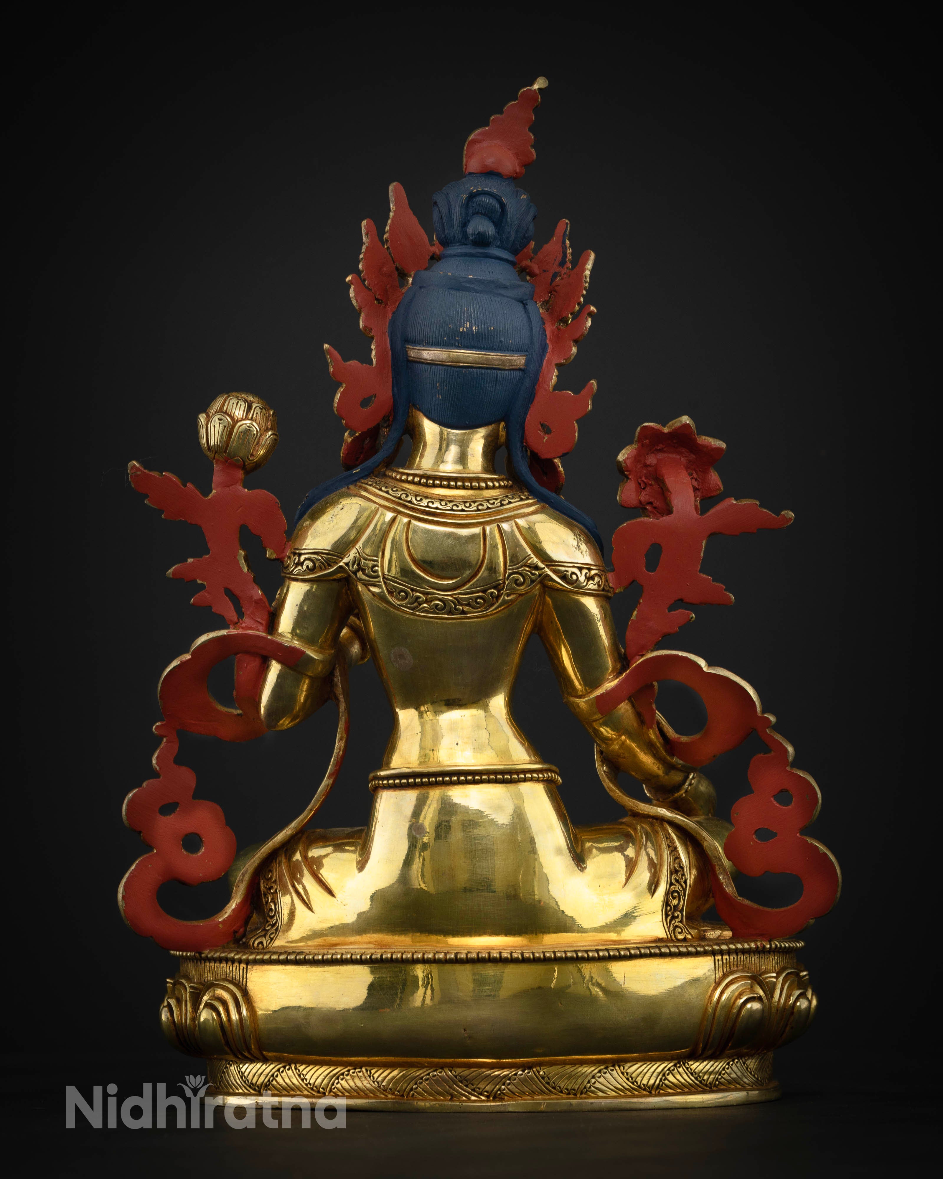 Back View of handcrafted Green Tara Buddhist statue with detailed lotus pedestal