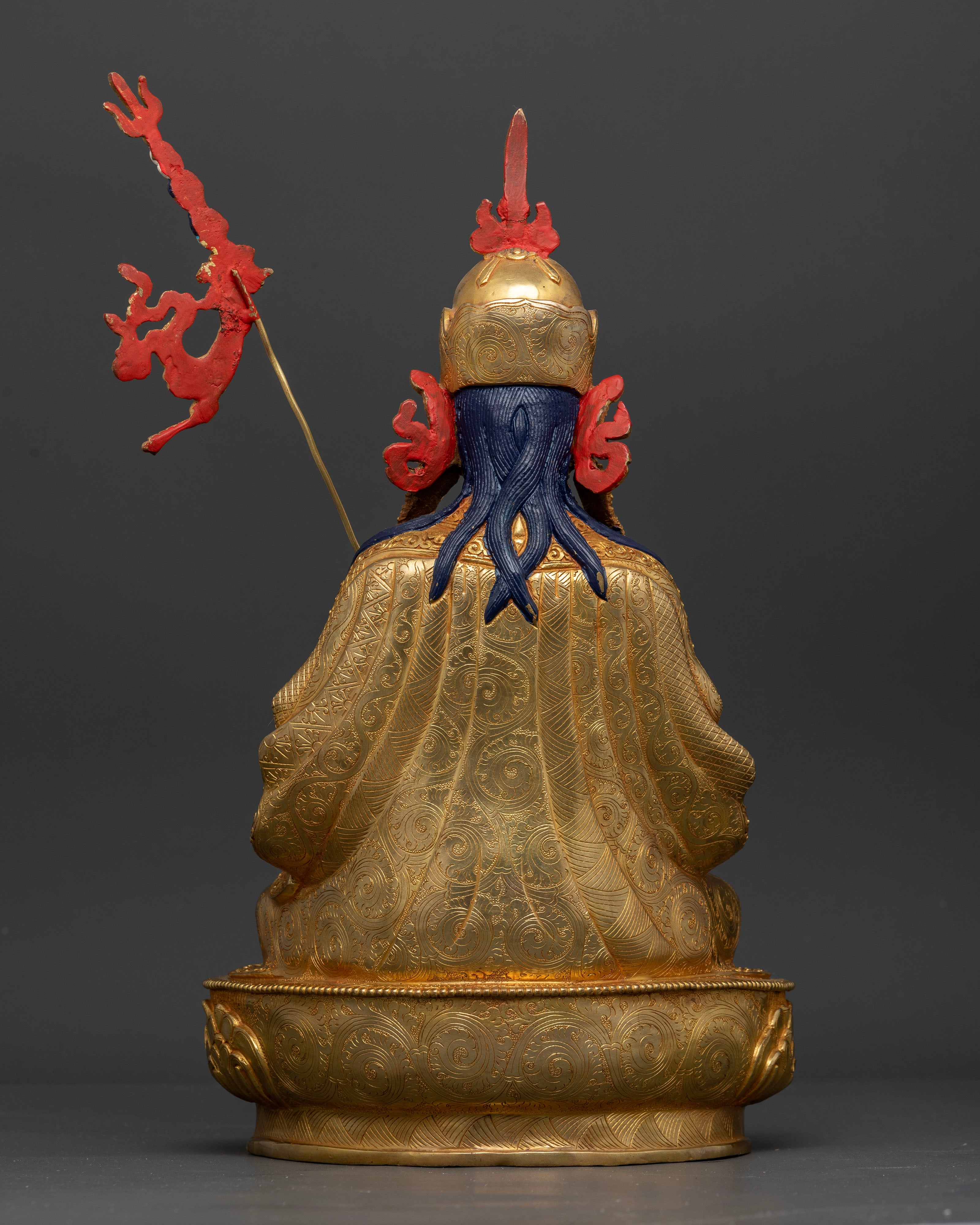 Back view of handcrafted Guru Rinpoche Statue with detailed robes and 24K gold fire gilding