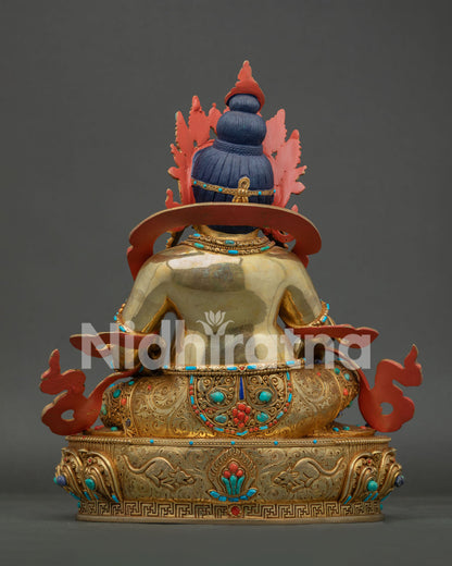 Back view of handcrafted Jambhala Statue showing detailed robes ornaments and traditional Nepalese craftsmanship