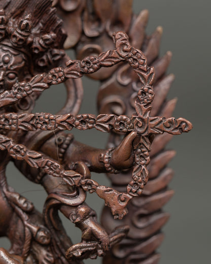 Back view of handcrafted Kurukulla statue from Nepal showcasing intricate oxidized copper artistry