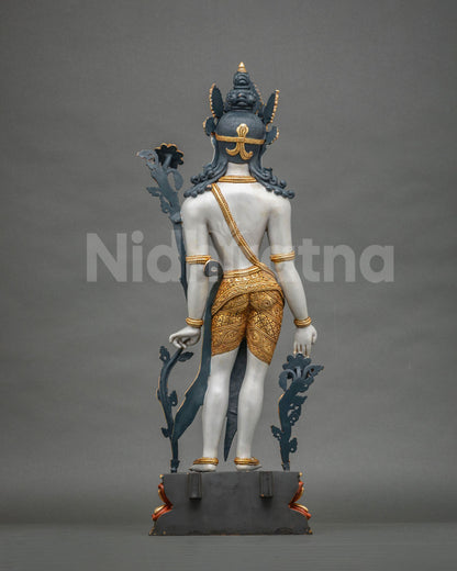 Back view of handcrafted Lokeshvara statue with gold gilded lower garment and detailed hair and crown