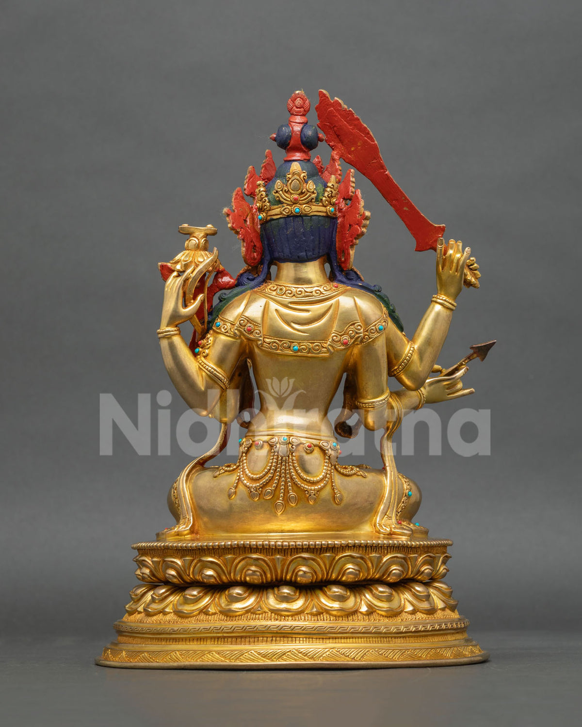 Back view of handcrafted Maha Manjushri copper statue with 24K gold fire-gilding and lotus pedestal