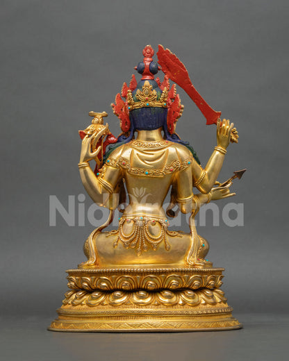 Back view of handcrafted Maha Manjushri copper statue with 24K gold fire-gilding and lotus pedestal